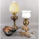 A quantity of miscellaneous. Two Victorian brass oil lamps, vintage wooden clogs, brass chandalier.