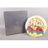 A Old Tupton Ware wall clock in poppy design. (boxed)