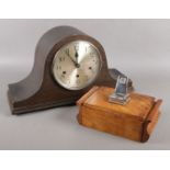 A Haller Westminster chime mantel clock, along with a vintage cigarette dispenser with calendar.