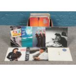 A box of mainly pop LP records, including Michael Jackson, Abba, U2, Elton John and Boney M.