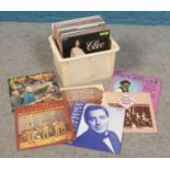 A box of LP records, mainly Jazz examples.