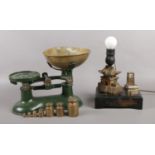 A set of Boots, Nottingham weighing scales, with seven weights, accompanied by an Oriental desk