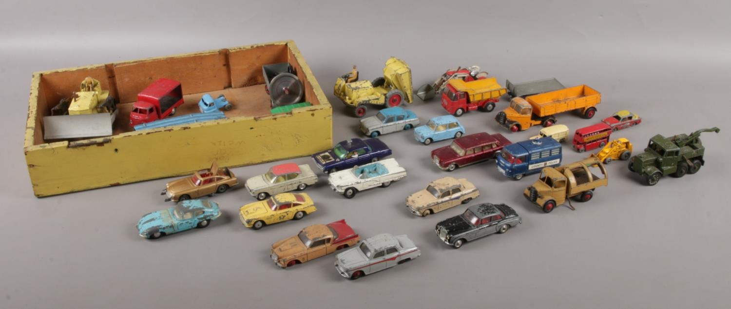 A selection of die-cast Dinky, Corgi and Matchbox vehicles. To include two Corgi Aston Martin