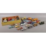A selection of die-cast Dinky, Corgi and Matchbox vehicles. To include two Corgi Aston Martin