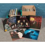 Two boxes of mostly LP vinyl records. Queen, Johnny Cash, Elvis, Don Mclean, Glady Knight etc