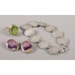 A small collection of silver jewellery. Includes Blue John clip on earrings, coin bracelet and a