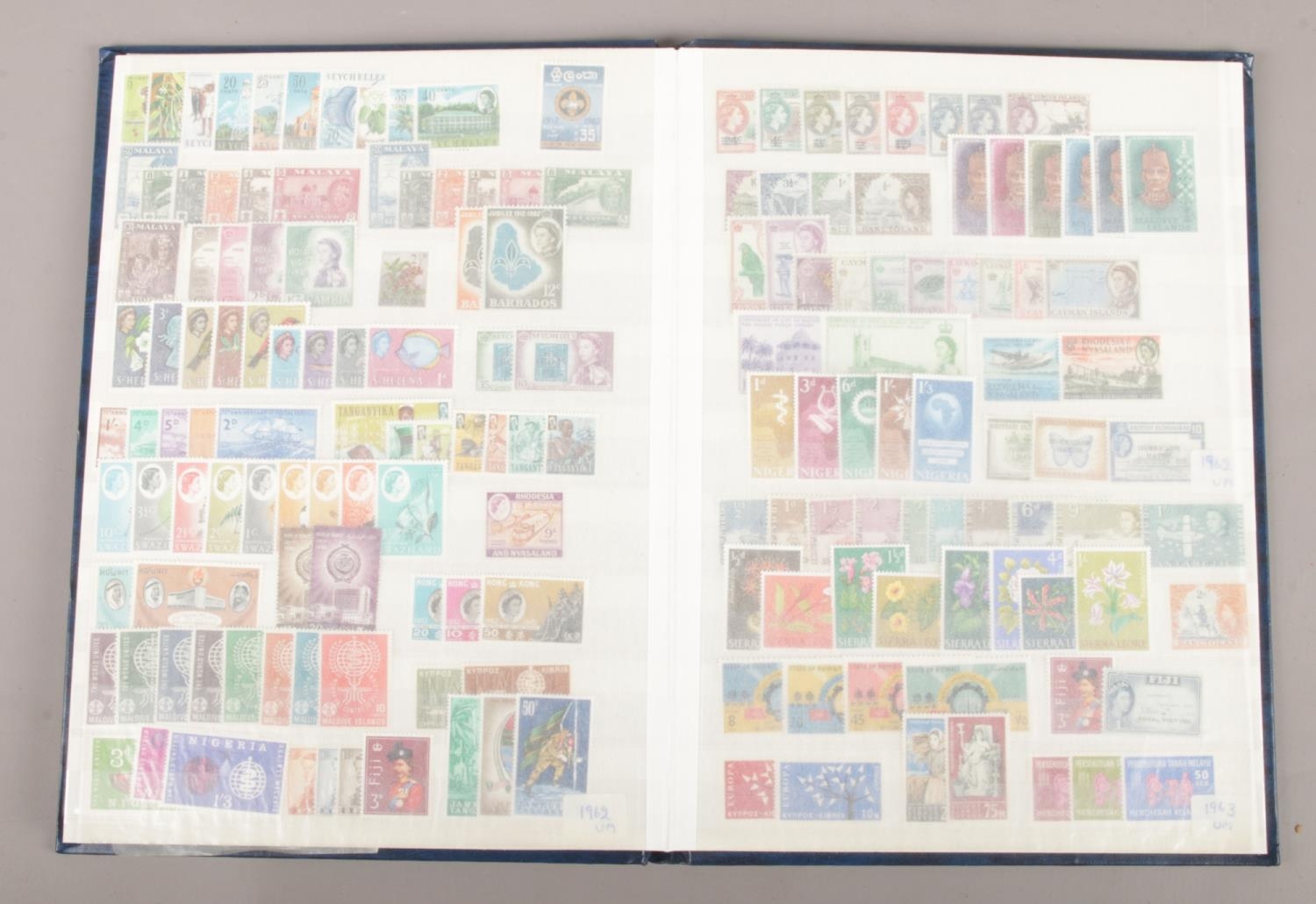 An album and collection of loose world stamps. The loose stamps all having original invoice - Image 4 of 5
