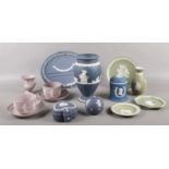 A collection of Wedgwood Jasperware ceramic's. Vase, cups/saucers, trinket box etc