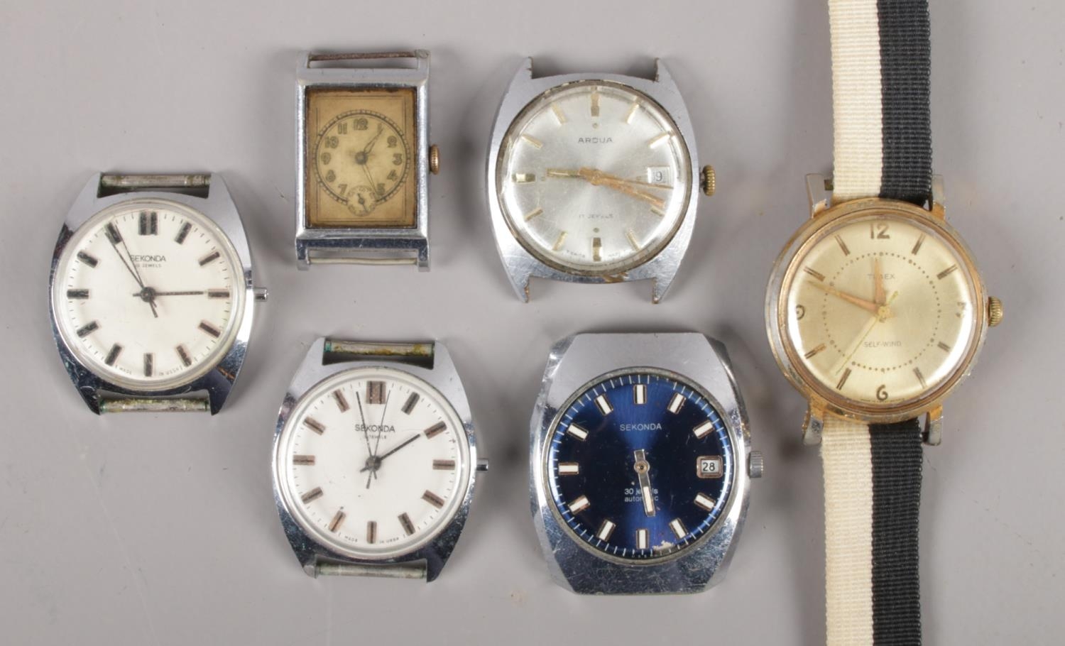 Six gents mechanical watches. Includes manual and automatic examples.