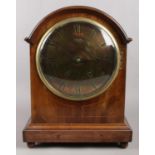 A Winterhalder & Hofmeier mahogany cased mantel clock. With pendulum and key. 38cm.