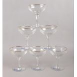 A collection of six vintage retro Babycham coupe glasses. Comprising of having the Babycham