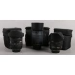 Three camera lenses. Includes Sigma Ex 50mm 1.4 DG HSM, Sigma Ex 10-20mm DC HSM and a Nikon Nikkor