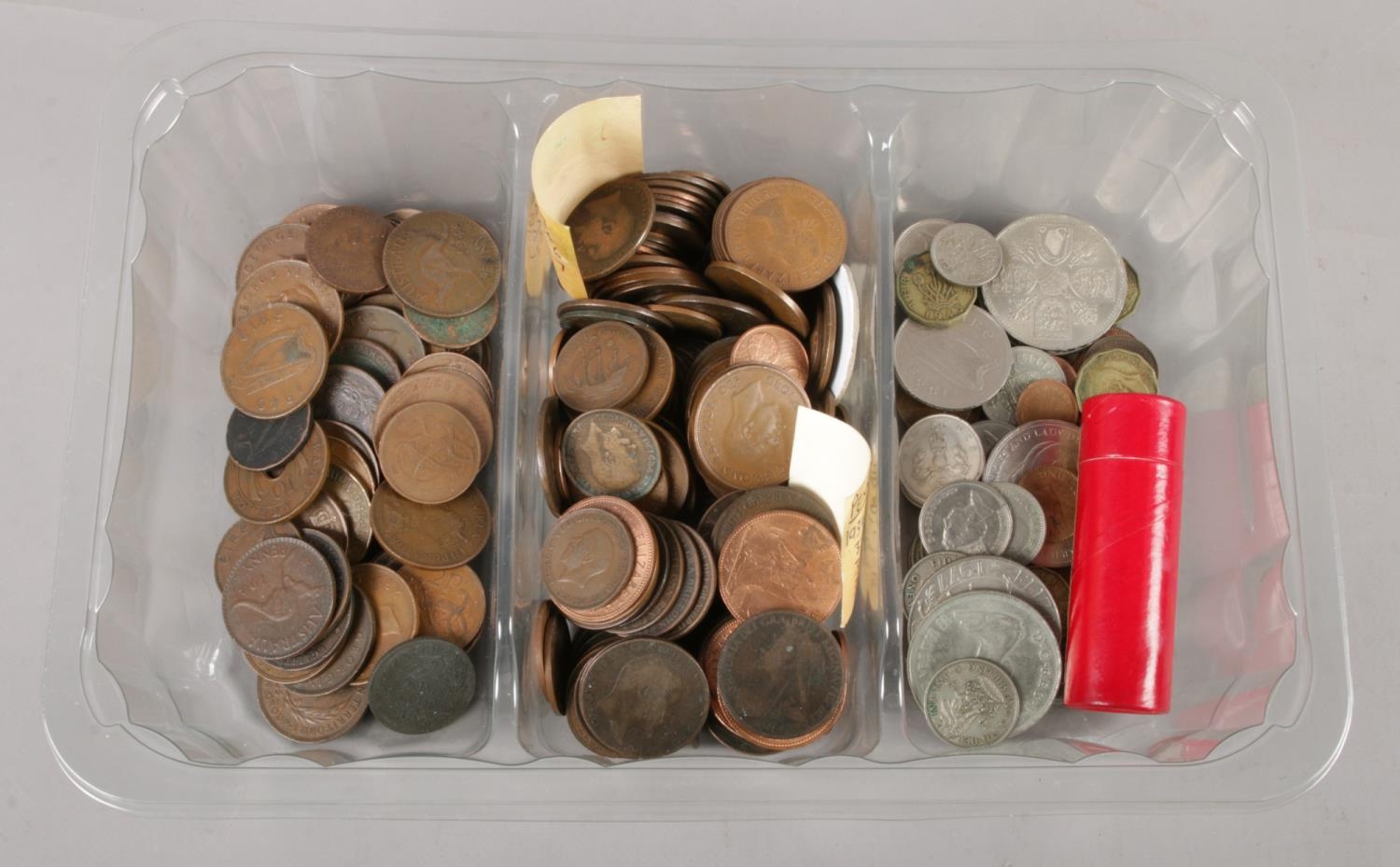 A box of pre decimal coins. Including British, crowns, three pence, Australia, etc. 2.7kg.