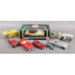 A collection of diecast vehicles. Includes boxed Corgi 1:18 scale MGB Roadster, Burago, Franklin