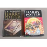 Two Harry Potter first edition books. The Deathly Hallows & the half-blood prince.