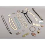 A quantity of costume jewellery. Beads, necklaces, rings etc