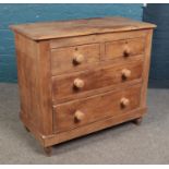 A Victorian pine chest of two over two drawers. Height 80cm, Width 92cm, Depth 47cm. Split to top.