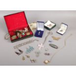 A quantity of costume jewellery. Brooches, necklaces, earrings etc.
