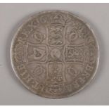 A Charles II silver crown, 1673. QVINTO edge.