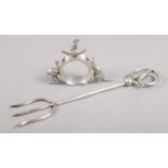 A Stokes & Sons of Melbourne, Australia EPNS toast fork and napkin ring, retailed by Dunklings.