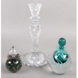 A Waterford Crystal candlestick along with two art glass scent bottles, one by Adrian Sankey.