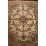 A large cream ground wool carpet. With floral decoration. (420cm x 298cm)