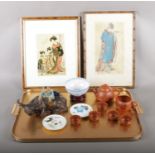 An assortment of oriental objects. To include an egg shell bowl on stand, terracotta teaset and