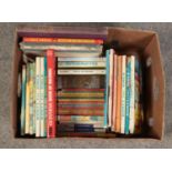 A box of mainly children's books and annuals. Includes Ladybird, Enid Blyton, Bunty for Girls etc.