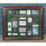 A fishing diorama display case and contents. H:44.5cm W:52cm D: 7.5cm.