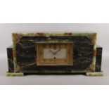 A large Art Deco marble mantel clock. (26cm x 57cm) Damaged to front foot.