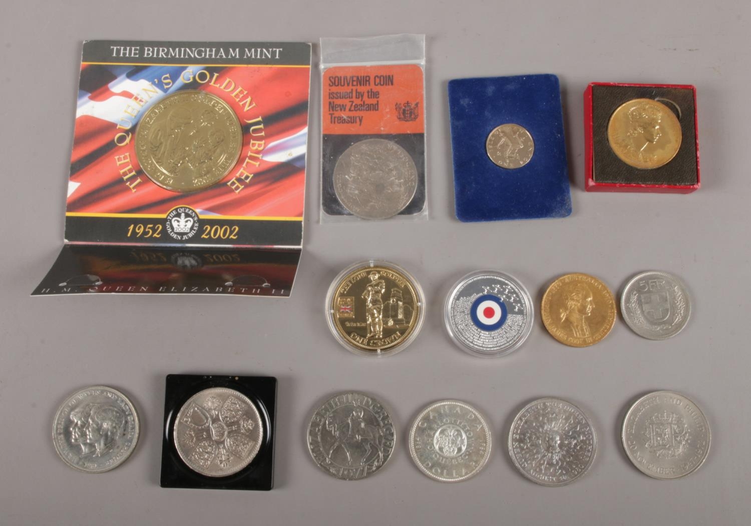 A small box of unusual crown coins from World & UK. to include RAF Battle of Britain 75th