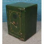 A Victorian green painted cast iron heavy duty safe. Unlocked with no key. (61cm)