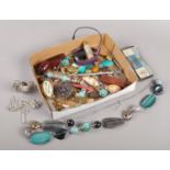 A box of collectables and costume jewellery. Includes necklaces, brooch, ladies wristwatches,