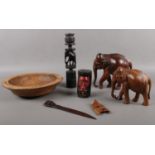 A quantity of wood & treen. To include elephant -candlestick, two figures, & bookmark.