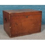A large two handled pine chest/blanket box. Has a brass small plaque to the top. H:44cm W:66cm D:
