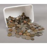 A box of British & foreign coins. Including German, USA, Shillings, six pence, crowns, etc. 2.1kg.