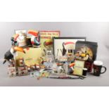 A large quantity of Guinness memorabilia with Toucan design. To include boxed clocks, two
