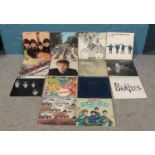 A selection of fourteen Beatles and John Lennon LP's. To Include: Please Please Me, Help!, Beatles