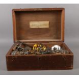 A Telco Ltd Tailstock & other watchmaker's accessories. In Oak case 33.5cm W