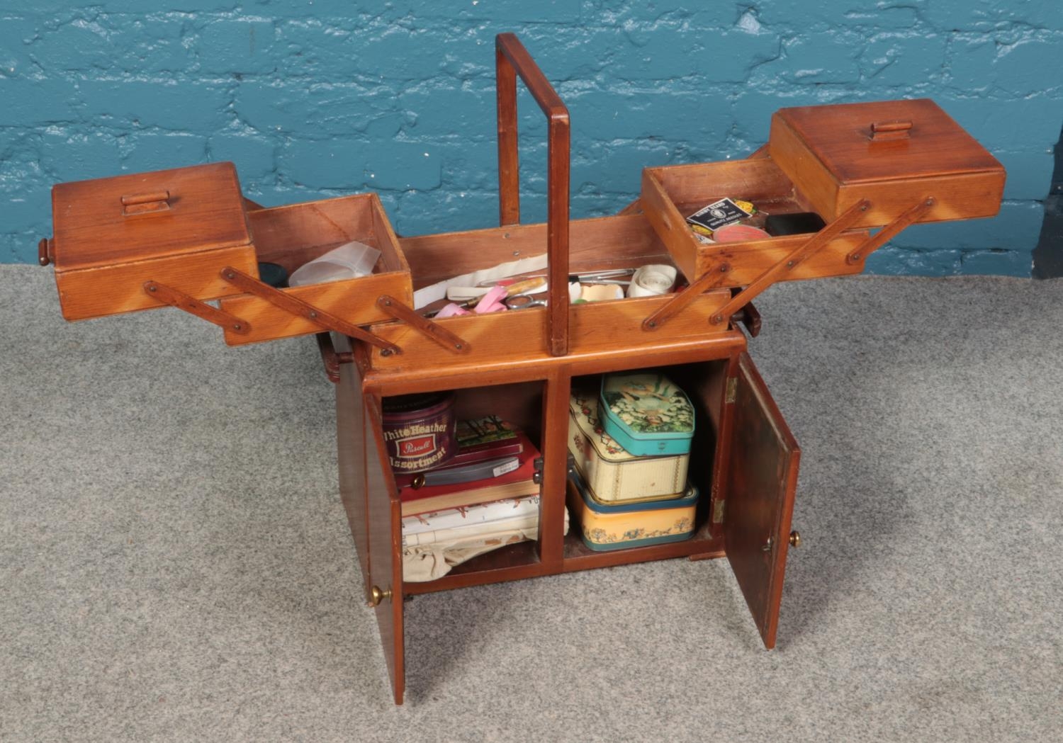 A mid twentieth century mahogany sewing cupboard, with lift-away cantilever box, with contents. 59cm - Image 3 of 4