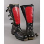 A pair of Lewis leathers Motorbike boots, size 10. Two straps missing at bottom of one boot. One