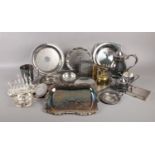 A box of assorted metalwares. To include tankard, teapot, milk jug, sugar bowl, trays and toast rack