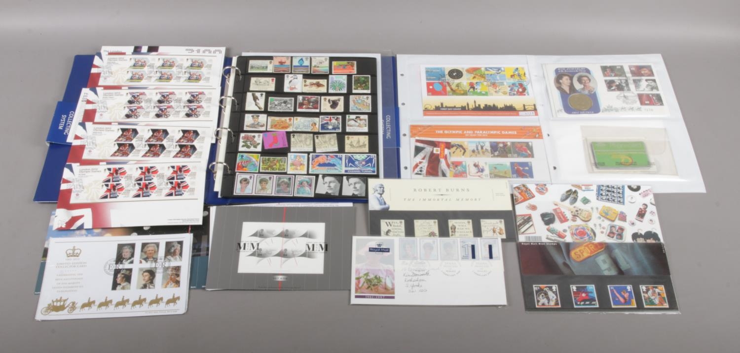 An album of mint stamps and 1st day covers. To include a set of four London 2012 Olympic Games