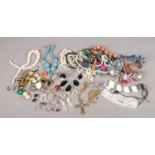 A quantity of costume jewellery. Beads, necklaces, earrings etc
