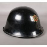 A vintage Rotherham C. P. Fire Brigade helmet (Helmets Ltd Wheathampstead)