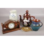 A mixed collection of ceramics, glass and a clock. Includes bargeware teapot, Baron Barnstaple motto
