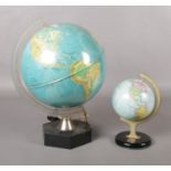 A Brevettato GdP Globe light, along with a tin ?The Chad Valley Co Ltd? globe. Largest: H: 37.5cm.