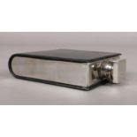 A Mercedes-Benz hip flask with leather cover. H: 11.5cm W: 8cm.