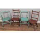 Four vintage folding chairs. Including example stamped 1943 to the base.
