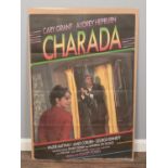 An original Spanish film poster advertising Charades (Charada), starring Cary Grant and Audrey